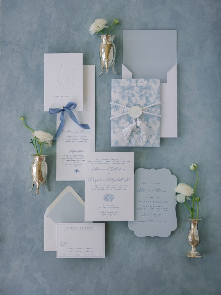 Luxury blue and white wedding invitation suite.