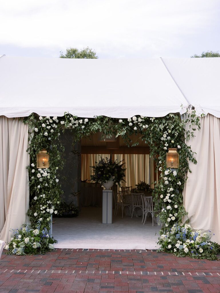 Greenery entrance to luxury tent wedding in Mississippi.